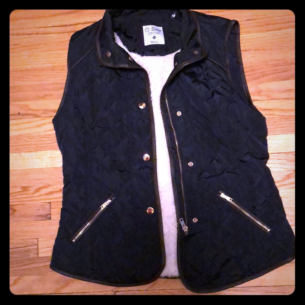 Ci Sono navy vest with brown and gold detail.
